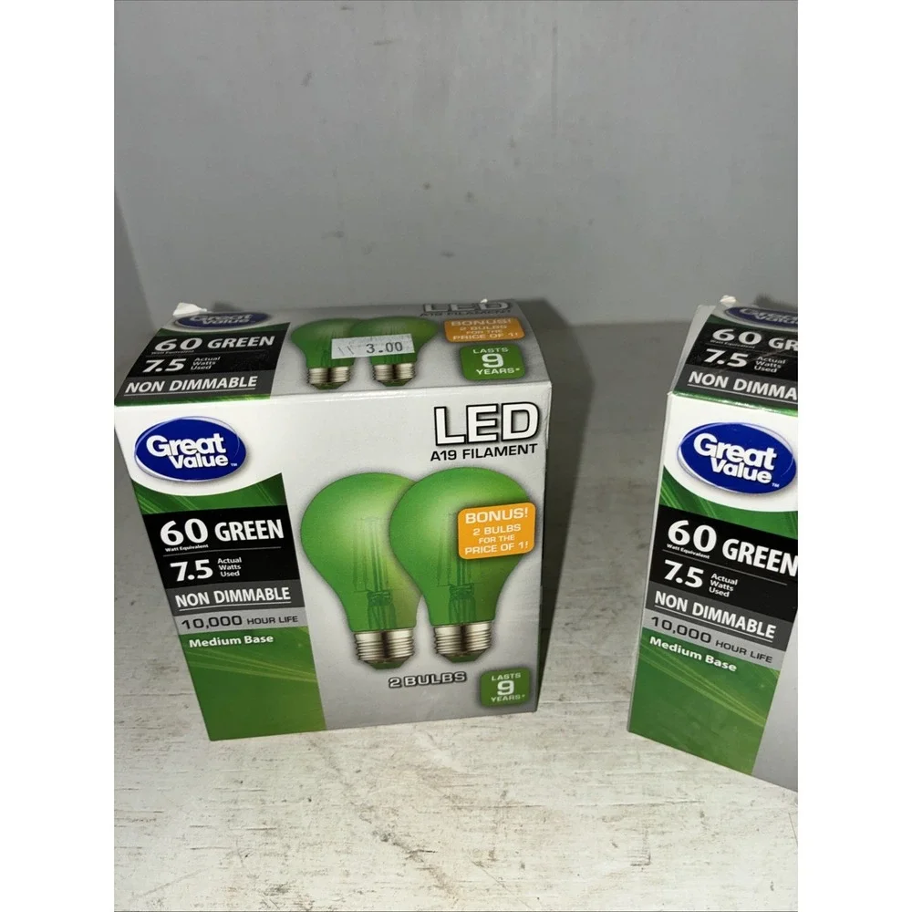 two packs of green great value LED 60 watt light bulbs A19 4 Bulbs NIB
